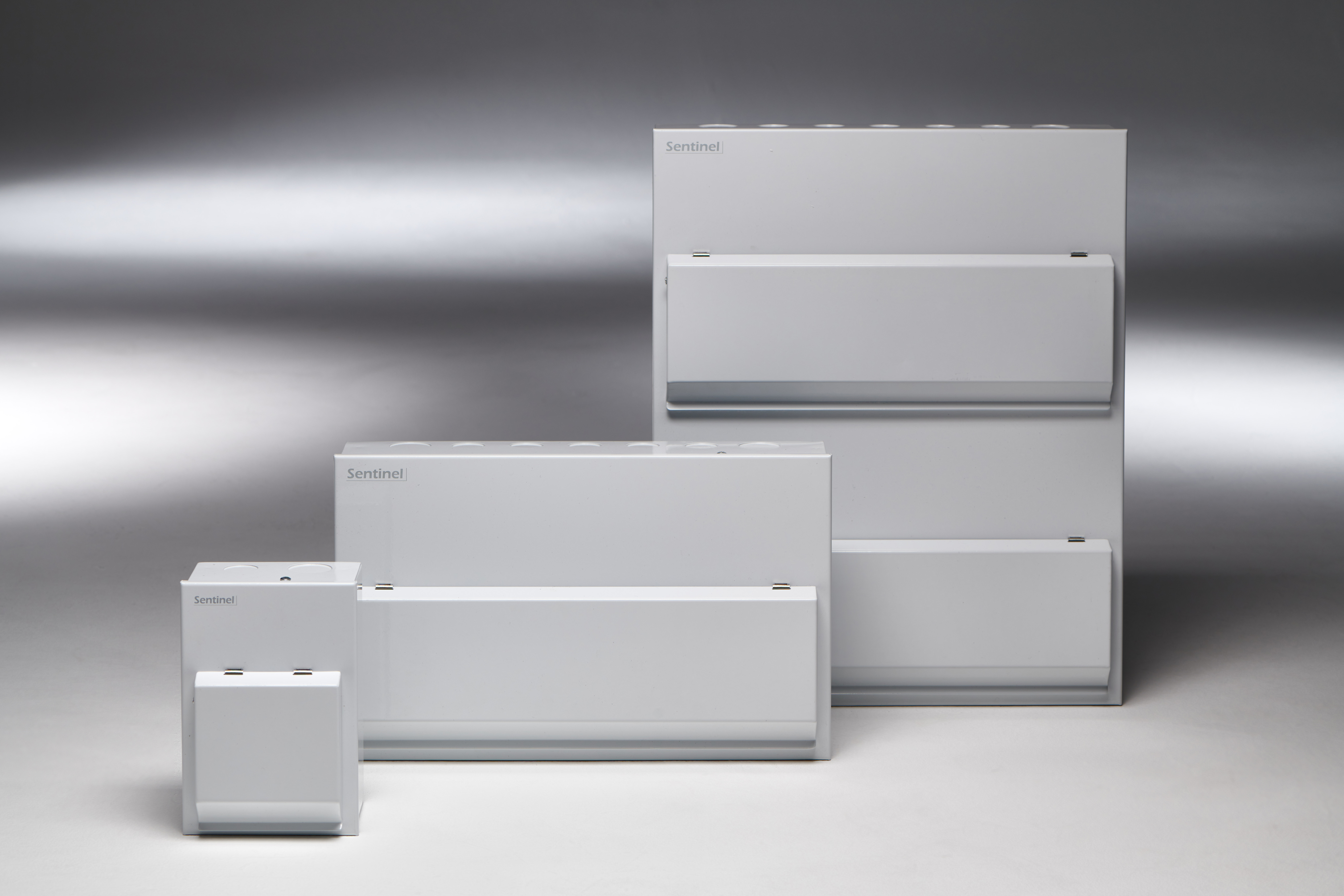 Sentinel consumer units with lids closed, also features Sentinel garage unit